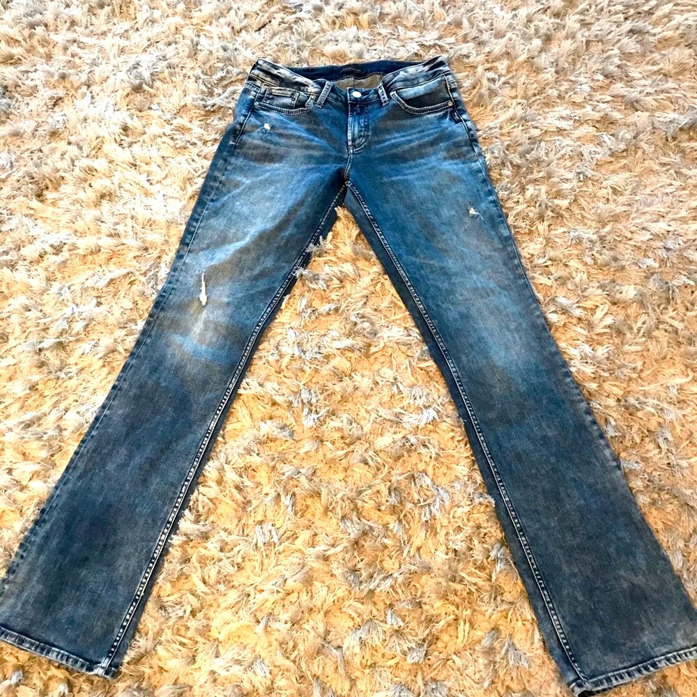 Silver mid rise boot cut jeans
